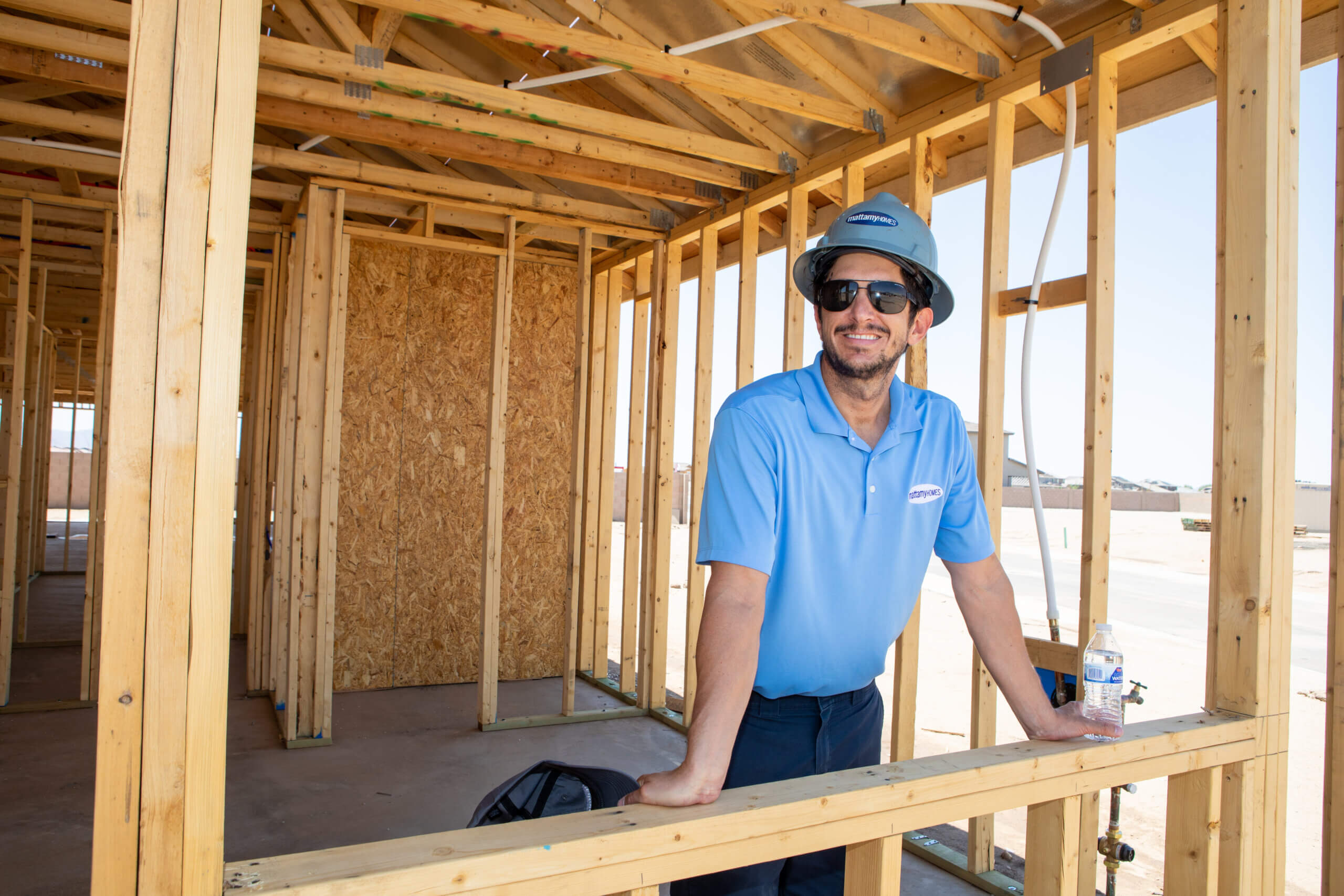 Walls framed out on a new construction home are being built by home builders in Arizona